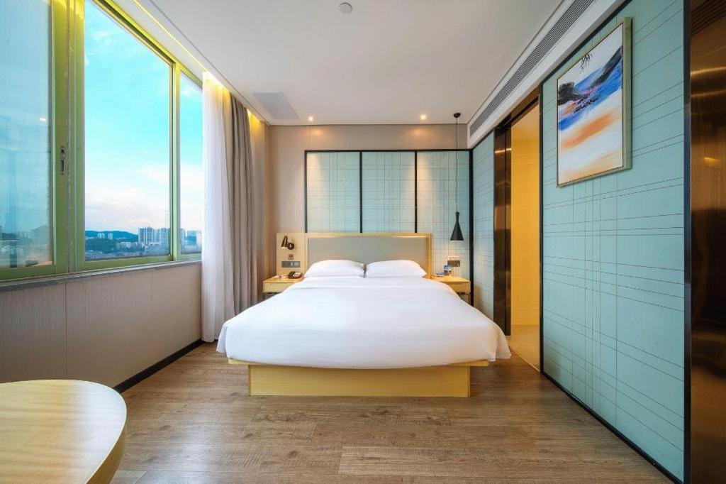 Echarm Hotel Yangjiang Baili Plaza Extérieur photo